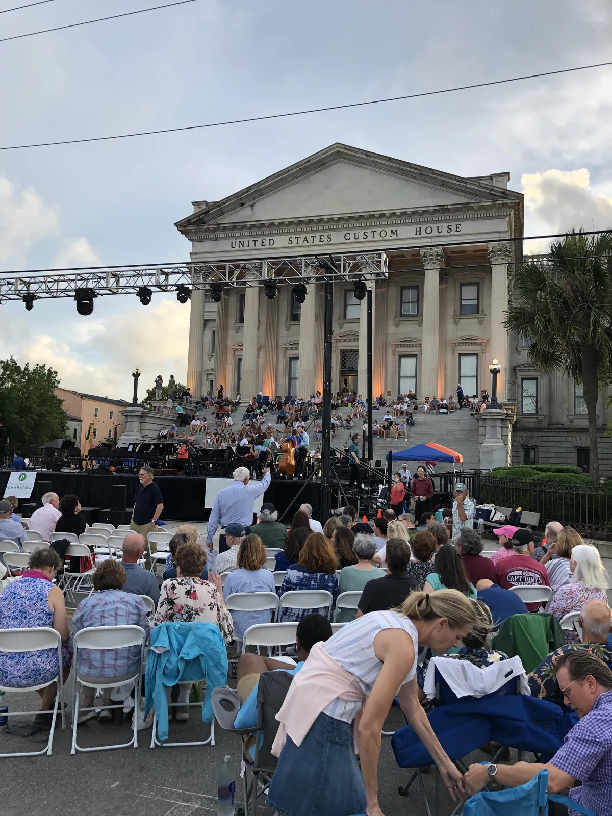 An outdoor Piccolo Spoleto audience at the United States Custom House